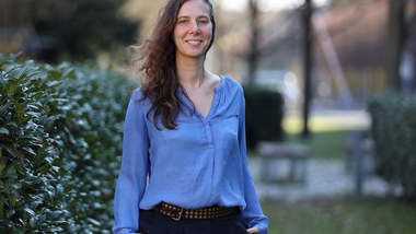 Rita Mateus stands smiling